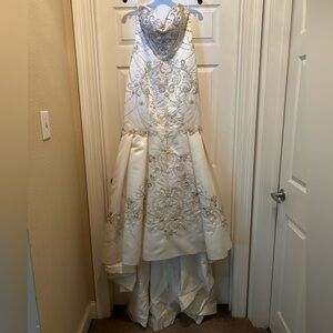 Wedding dress worn once. Still married. Celebrating 10 years.